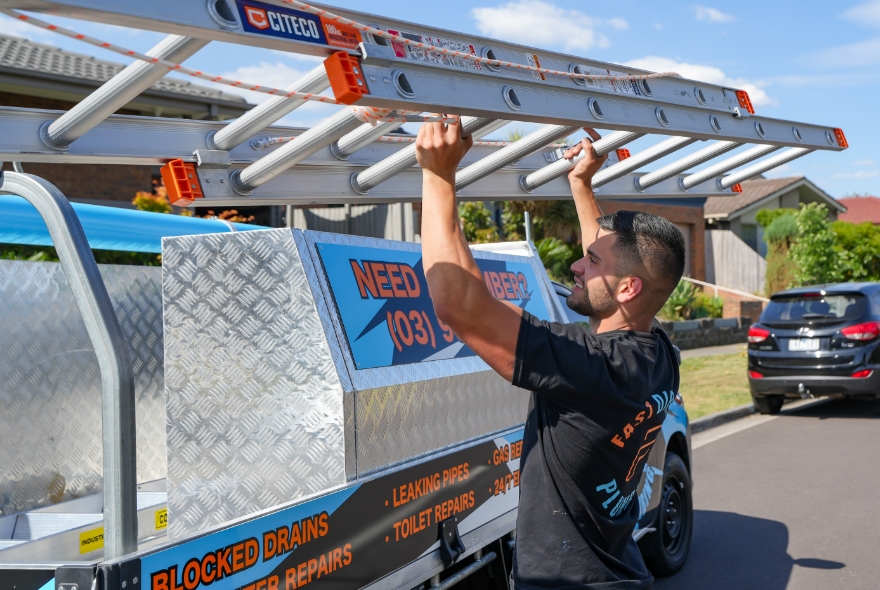 Taking Ladder Off Car
